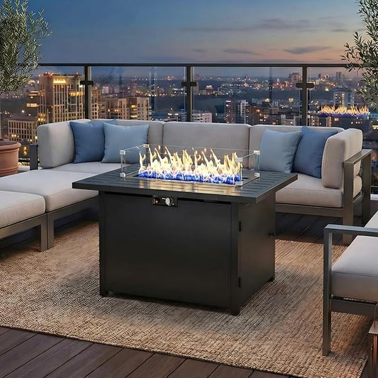 FansaFurn 43 inch propane fire pit table with lava rock on a backyard patio