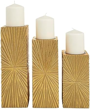 CosmoLiving by Cosmopolitan Wood Geometric Carved Pillar Candle Holder, Set of 3 12", 10", 8"H, Gold by CosmoLiving