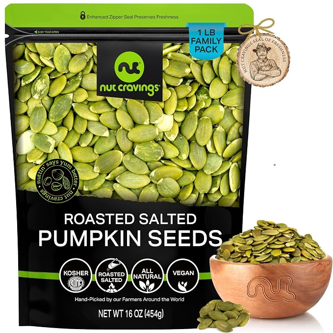 NUT CRAVINGS - Roasted & Salted Pumpkin Seeds, Pepitas, No Shell (16oz - 1 LB) Packed Fresh in Resealable Bag - Nut Snack - Food Assortments