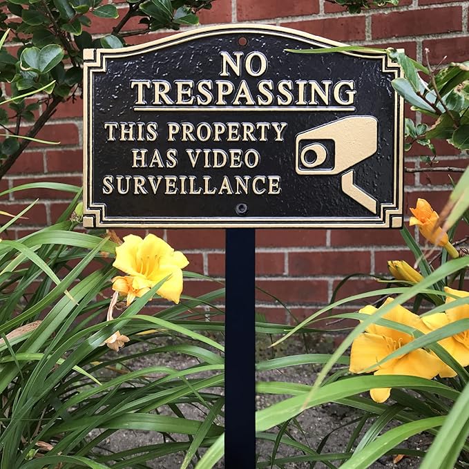 SmartSign 5.75 x 9.5 inch “No Trespassing - This Property Has Video Surveillance” GardenBoss Statement Plaque with 18 inch Lawn Stake, 375 mil Rustproof Aluminum, Black and Gold, Set of 1, USA-Made