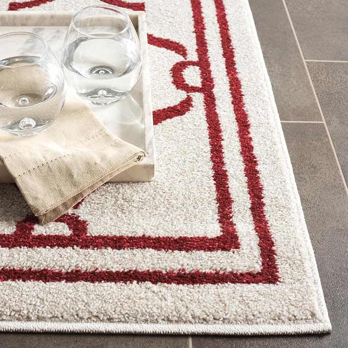SAFAVIEH Amherst Collection Area Rug - 9' x 12', Ivory & Red, Trellis Design, Non-Shedding & Easy Care, Ideal for High Traffic Areas in Living Room, Bedroom (AMT414H)