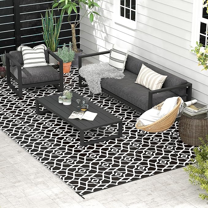 Outsunny Outdoor Rug for Patio, 9' x 18' Waterproof Large Mat, Reversible Plastic Straw Rug for Decor, Portable Outside RV Camping Area Carpet Mat for Backyard Porch Deck Picnic, Black & White Clover