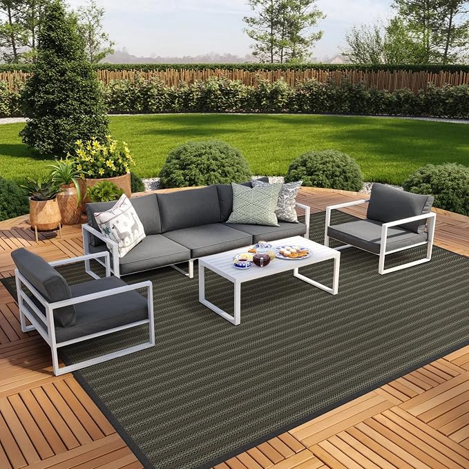GENIMO Outdoor Rug for Patio Clearance, 10'x14' Reversible Plastic Straw Rugs, Lightweight Waterproof RV Camping Mat for Camper, Balcony, Deck, Backyard, Picnic, Black & Brown