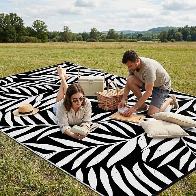 Smiry Outdoor Rug 6x9 ft, Waterproof Reversible Plastic Straw Rugs, Outdoor Area Rug with Leaf Pattern, Outside Floor Mat for Patio, Backyard, Deck, Picnic, Beach, Camping, Black & White